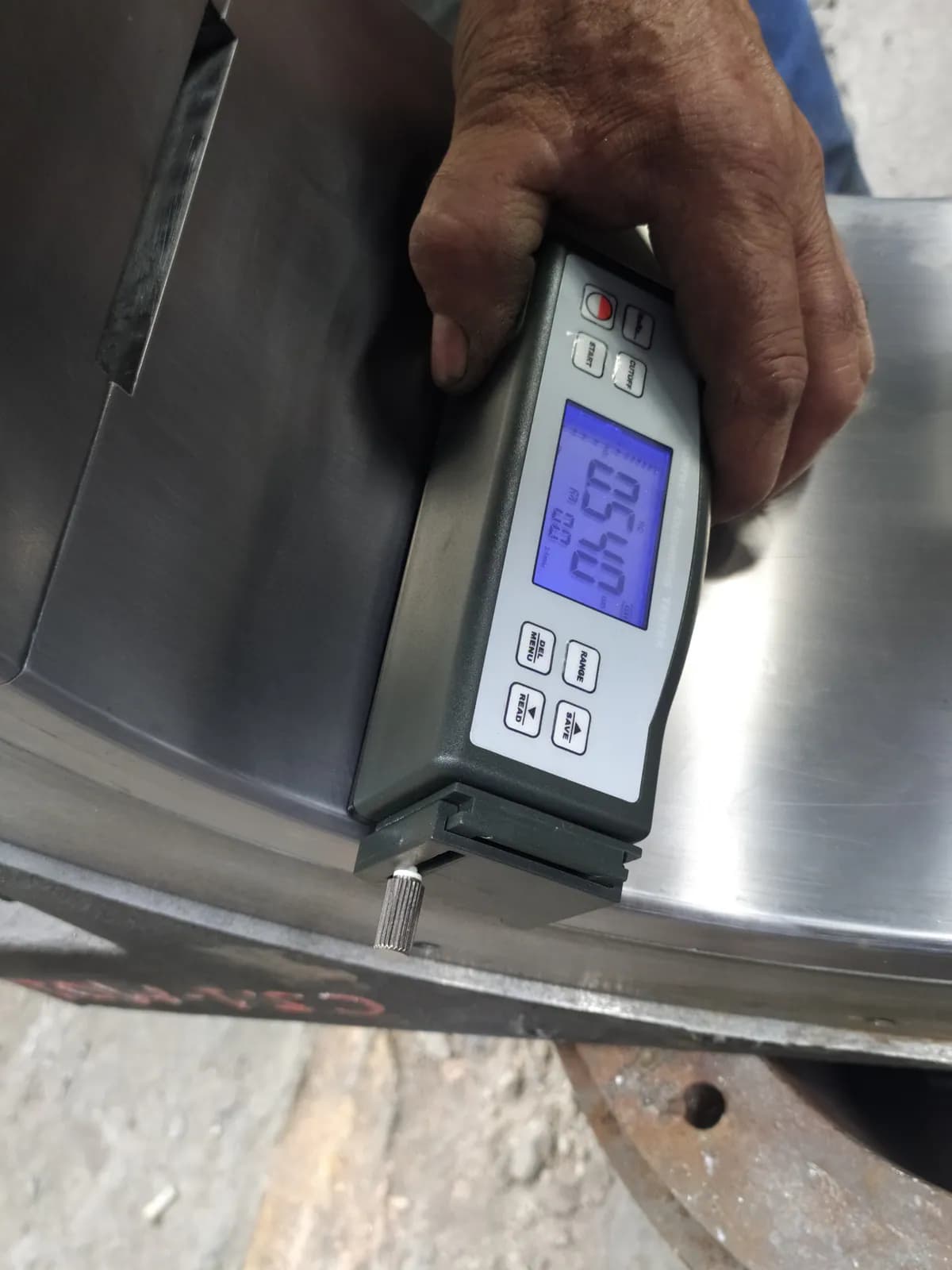 Surface roughness test on a machined metal component using a portable roughness tester