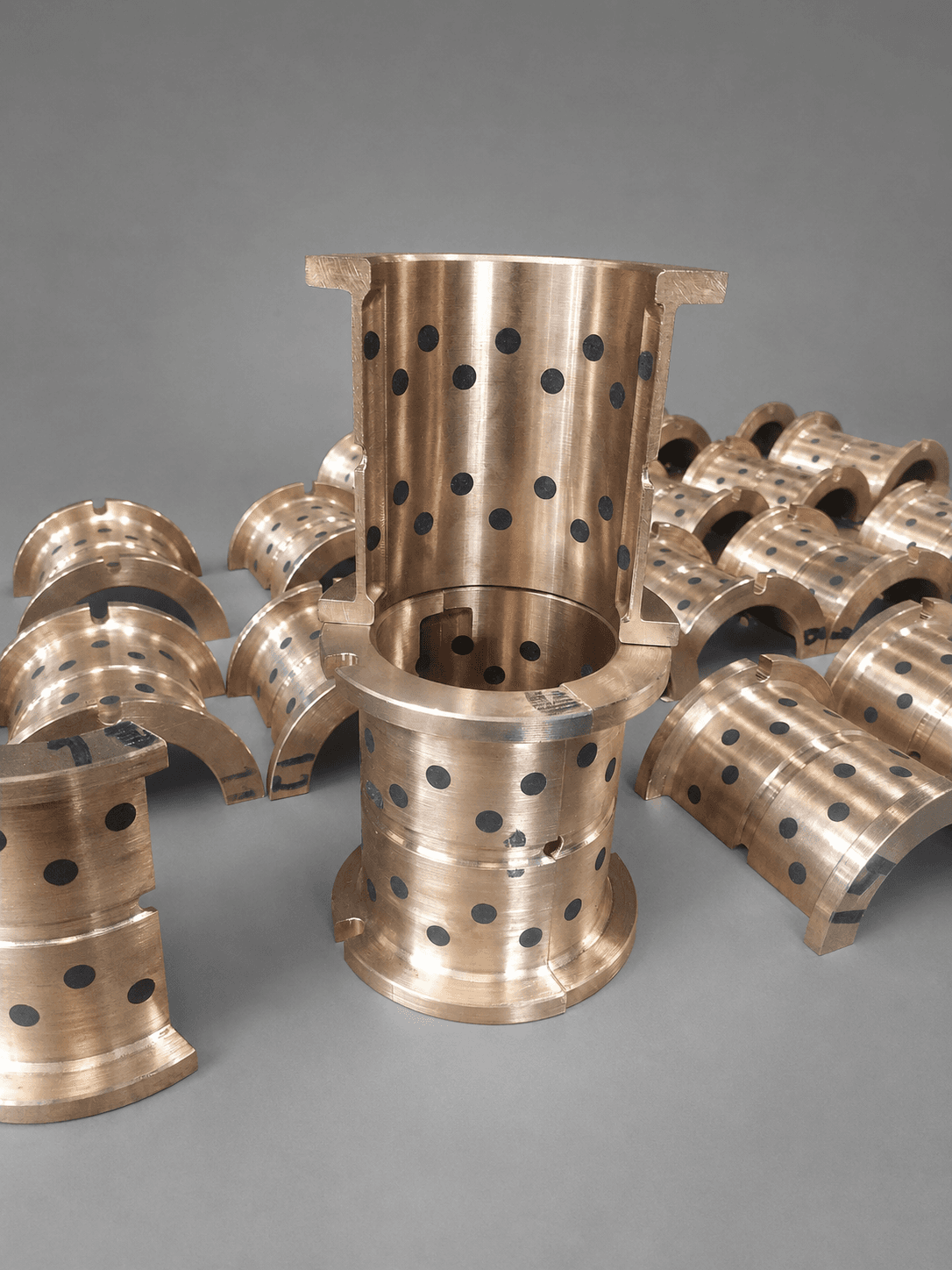 Custom graphite-plugged bushings manufactured by Itametais